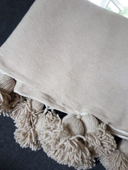Pom pom teppe Beige