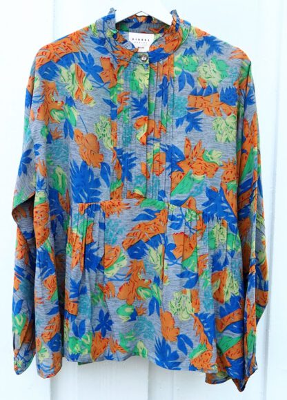 Ria Silk Peplum Top | 2